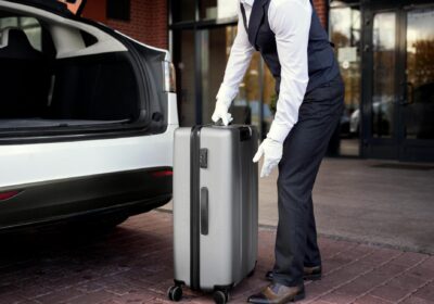 side-view-valet-holding-baggage (3) (1) side-view-valet-holding-baggage (3) (1)